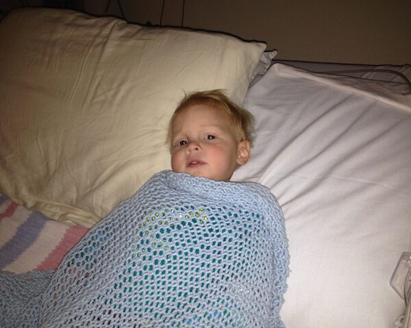 Caleb's son Jude in the hospital before surgery