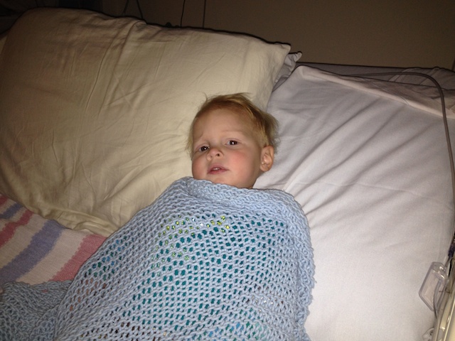Caleb's son Jude in the hospital before surgery