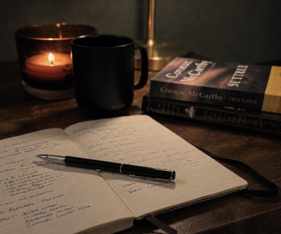 Caleb Zahnd's desk with an open notebook
